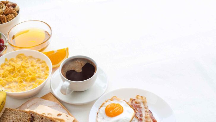 Breakfast foods arranged on a serving surface
