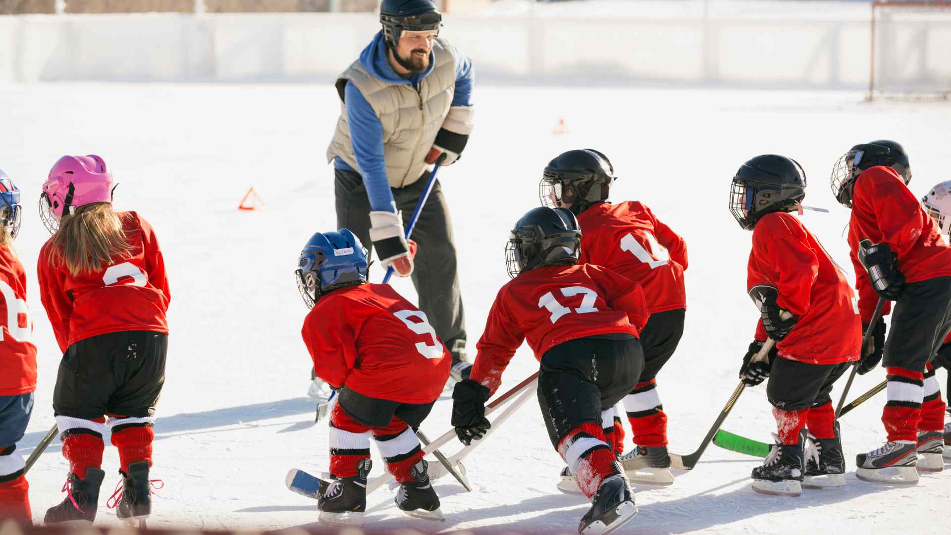 Athlete holding a stick during outdoor play