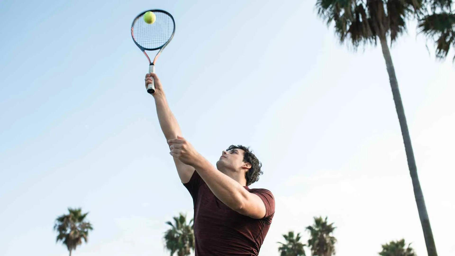 Athlete competing with a racket on an outdoor court