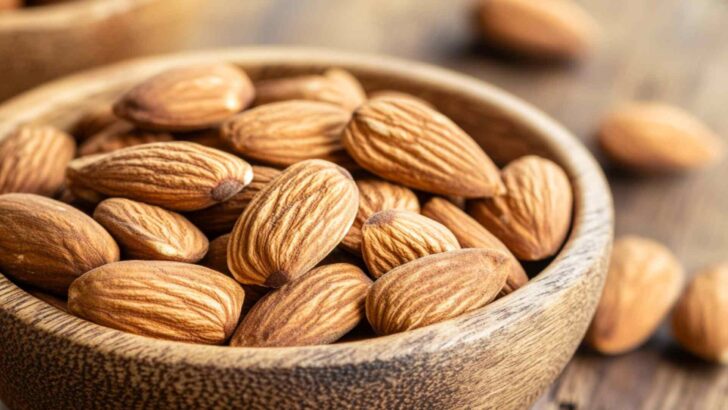 Whole nuts piled in a wooden bowl