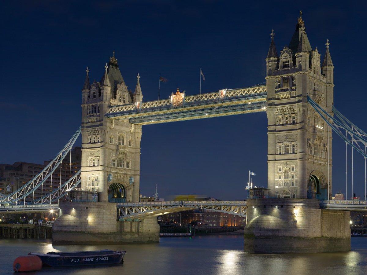 Tower Bridge illuminated against the evening sky
