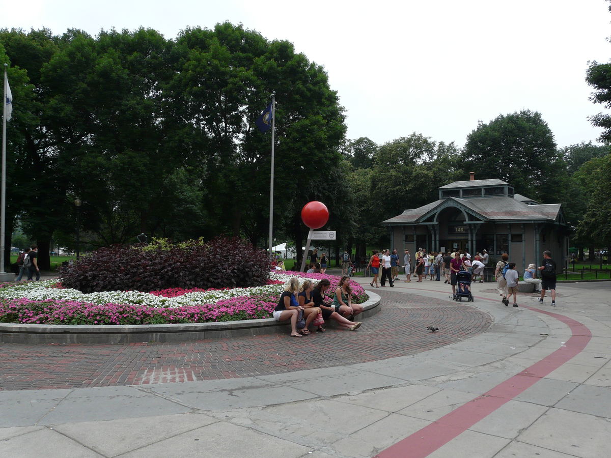 Flower beds, trees, and visitors in Boston Common