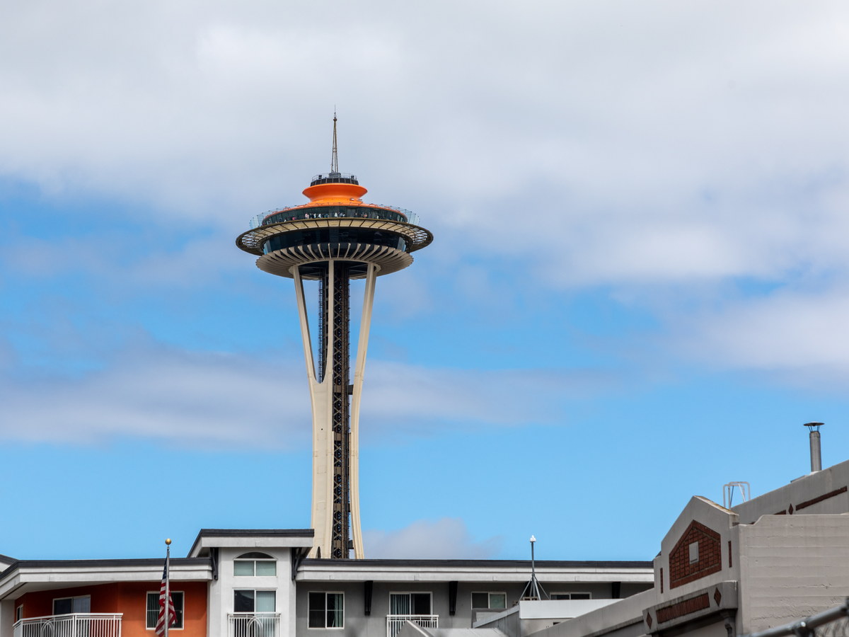 Space Needle rising above buildings in Seattle