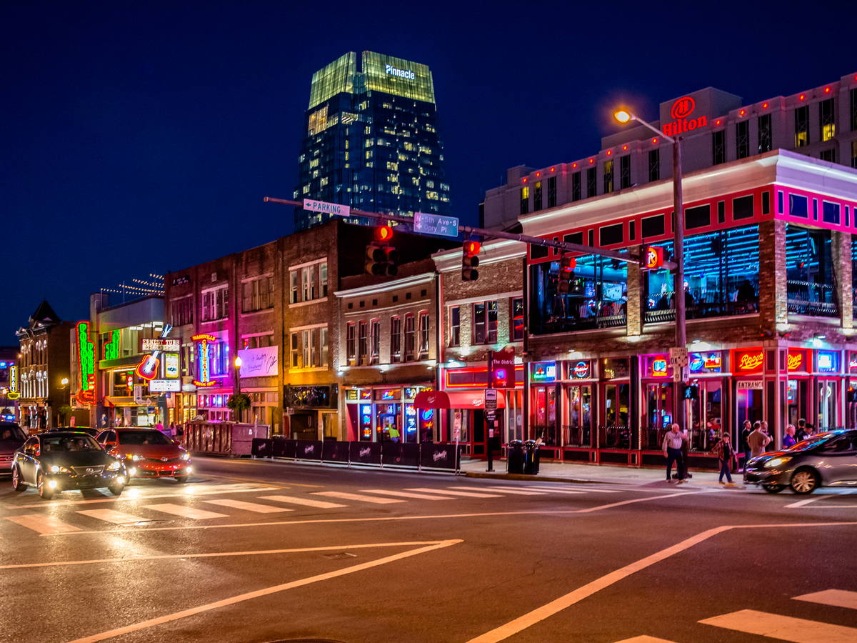 Colorful neon signs along Broadway in Nashville at night