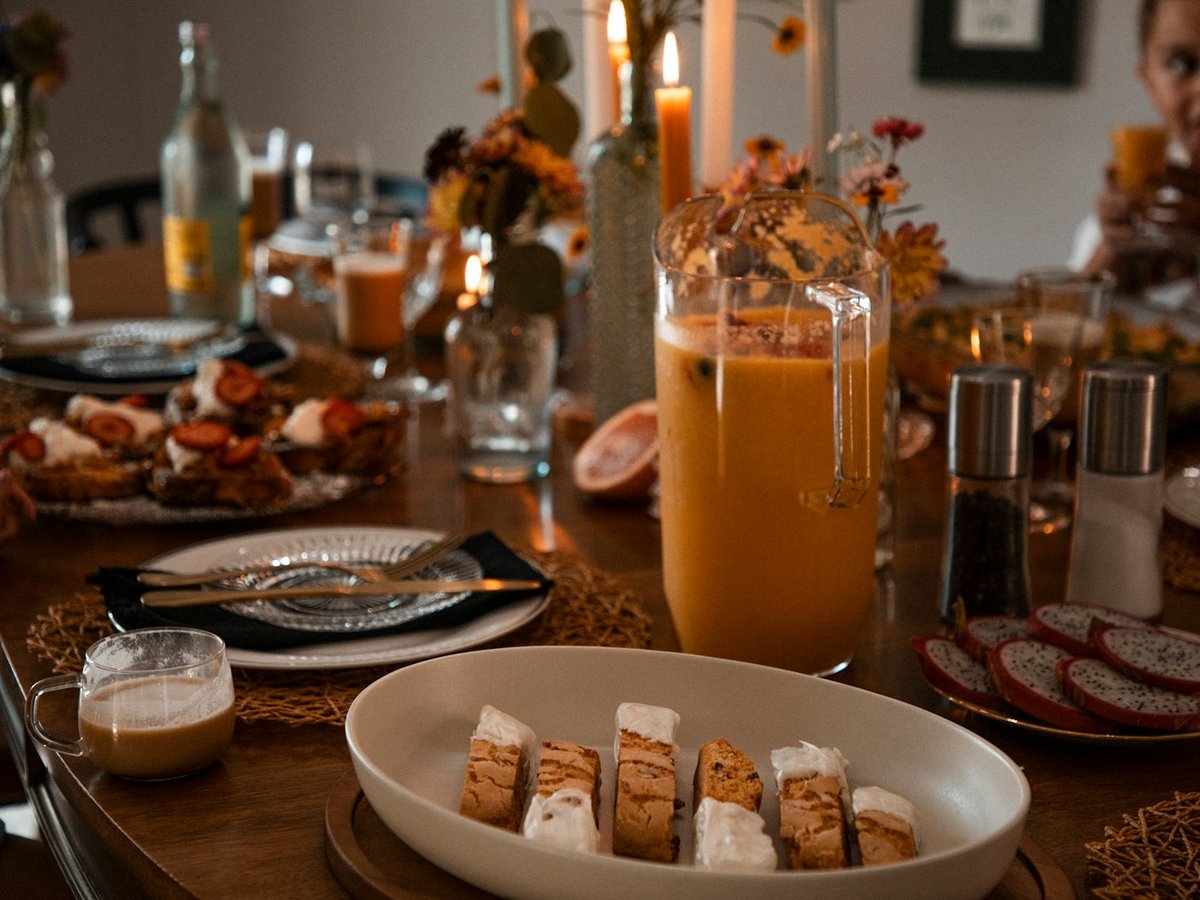 Brunch table set with pastries and drinks