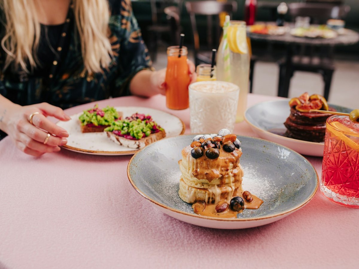 Pancakes and avocado toast served at brunch