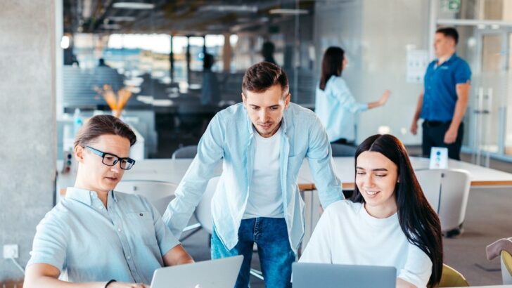 People reviewing documents together before making a choice
