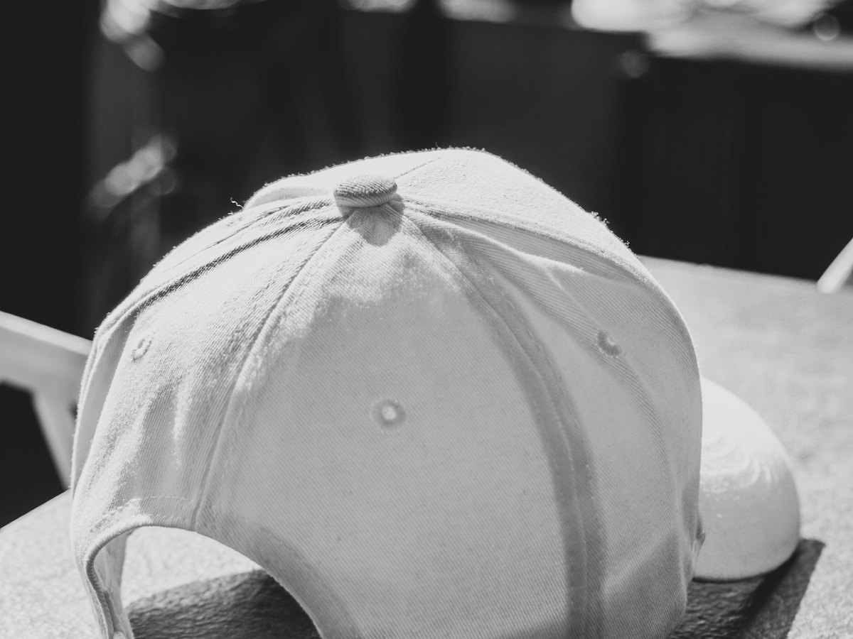 Baseball cap resting on an outdoor table
