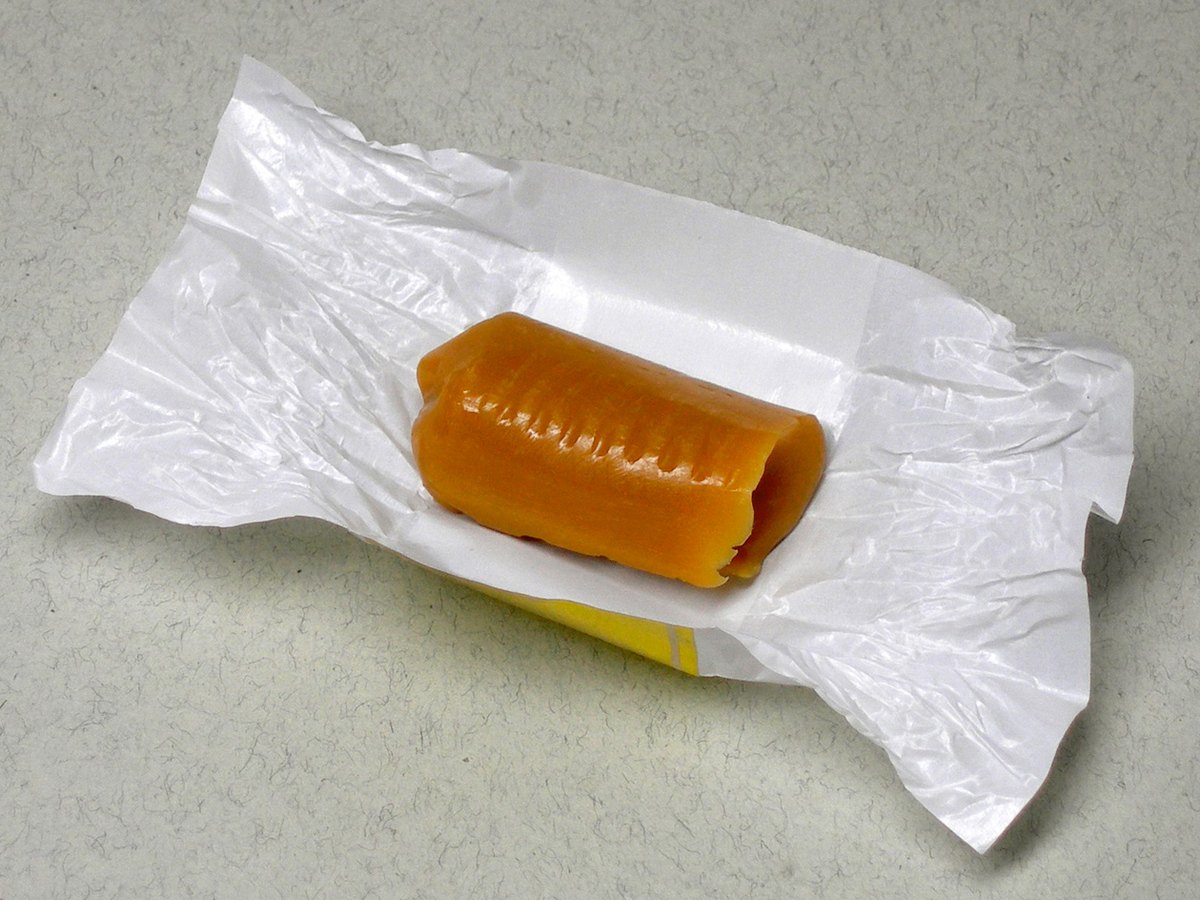 Golden caramel candy pieces in a close-up view