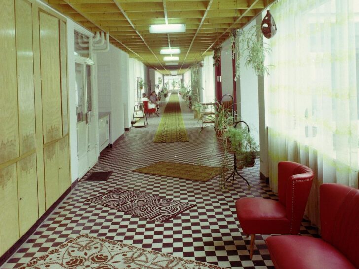 Colorful patterned carpet covering an interior floor