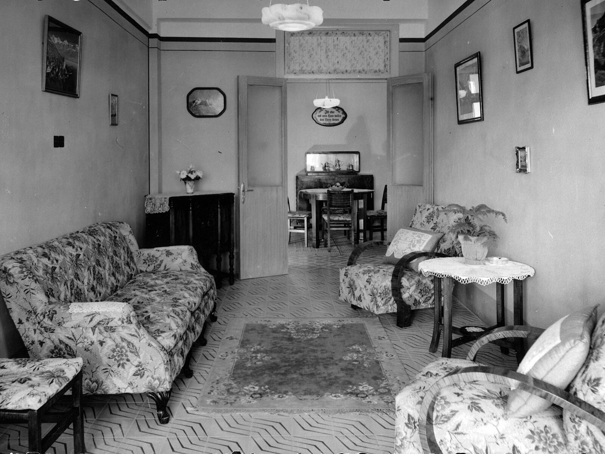Large carpet beneath furniture in an ornate interior