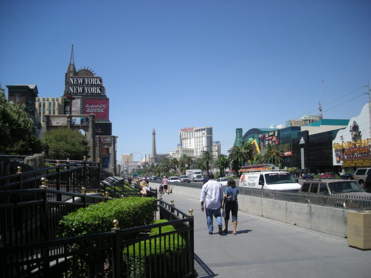 Pedestrians walking along the Las Vegas Strip by day