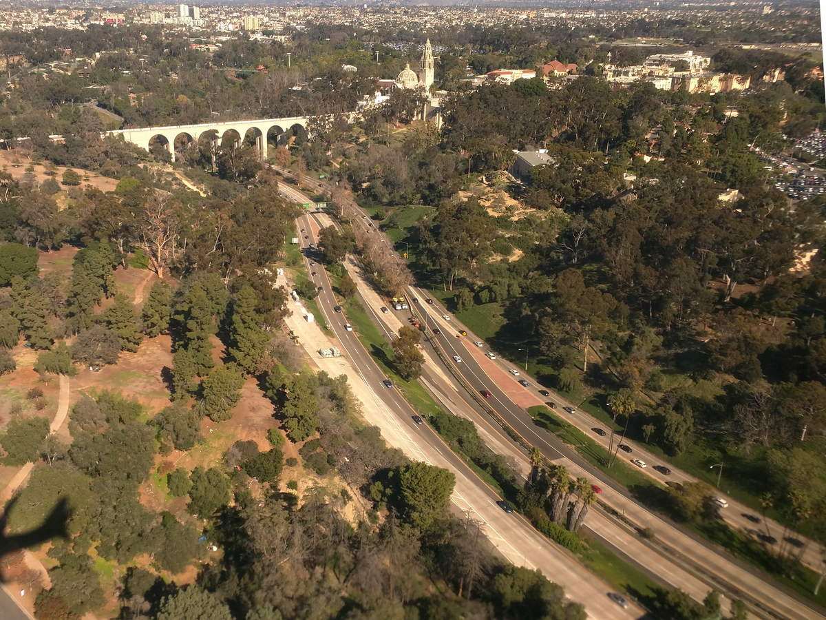 Aerial view of roads and green hills in San Diego